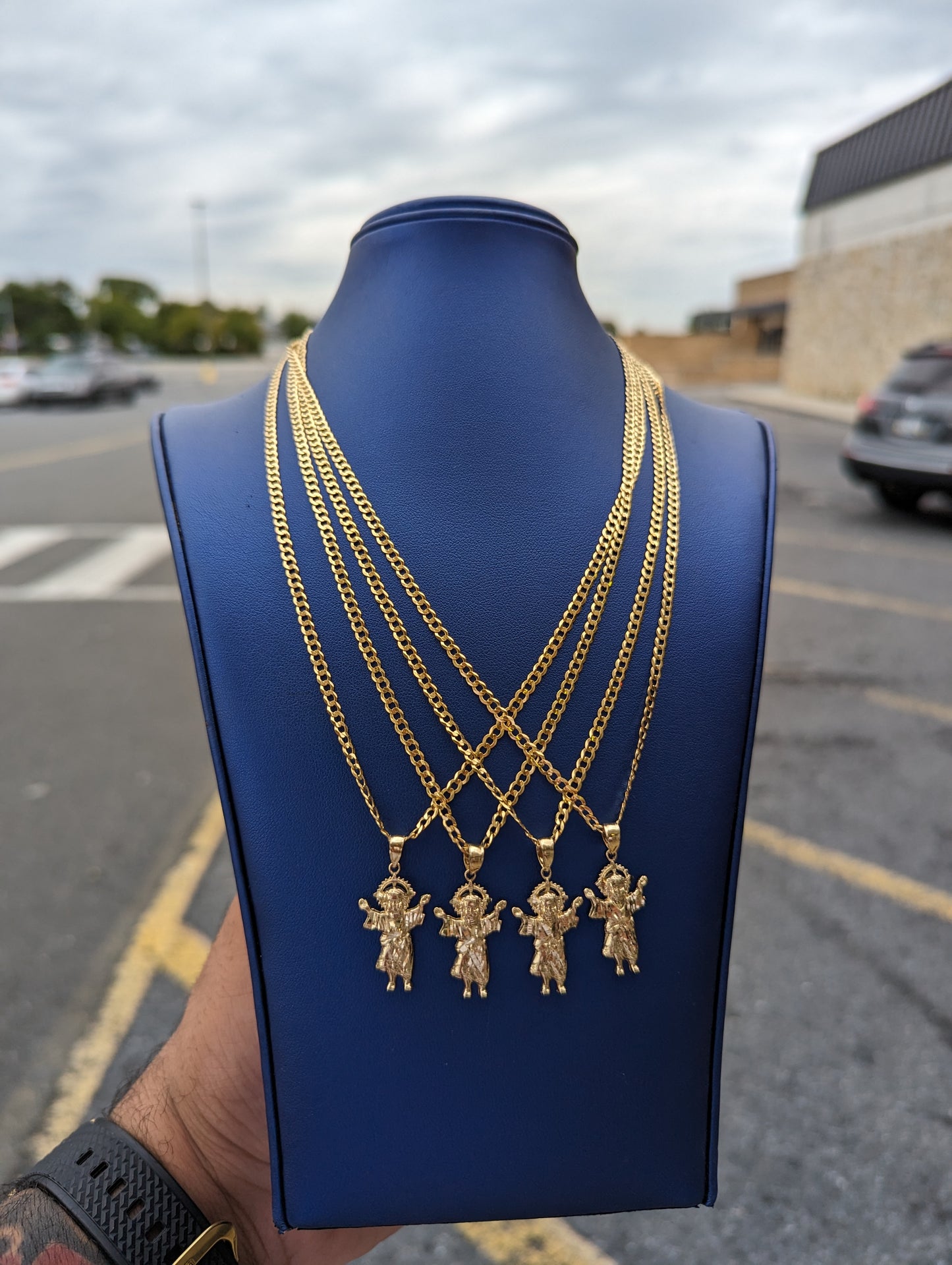 14k solid cuban chain with divino niño pendant