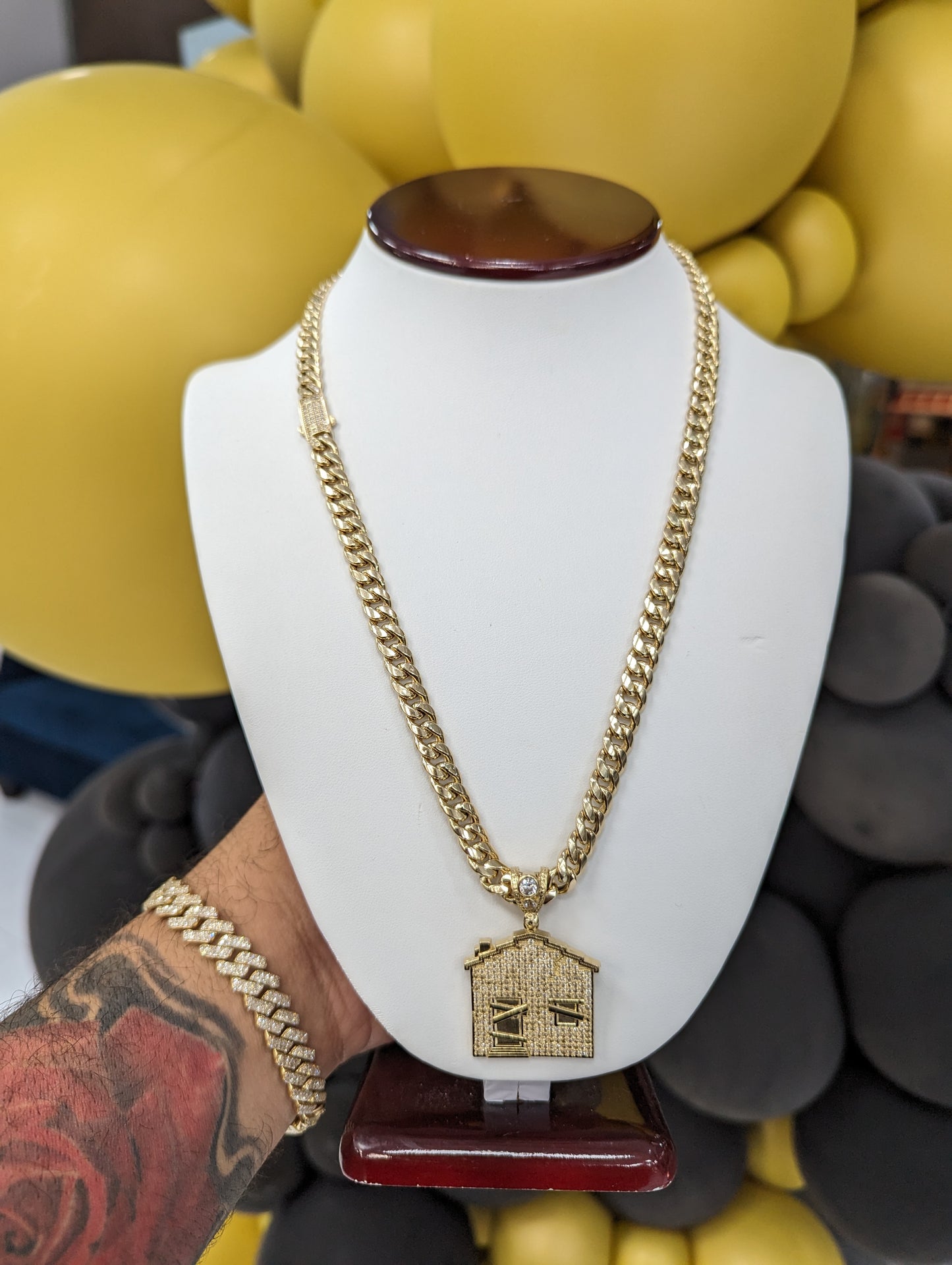 14k Cuban chain with trap house pendant with cz